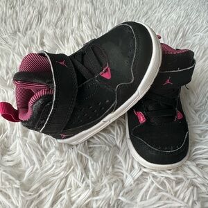 Nike Flight Jordan’s pink and black high top sneakers size 5c